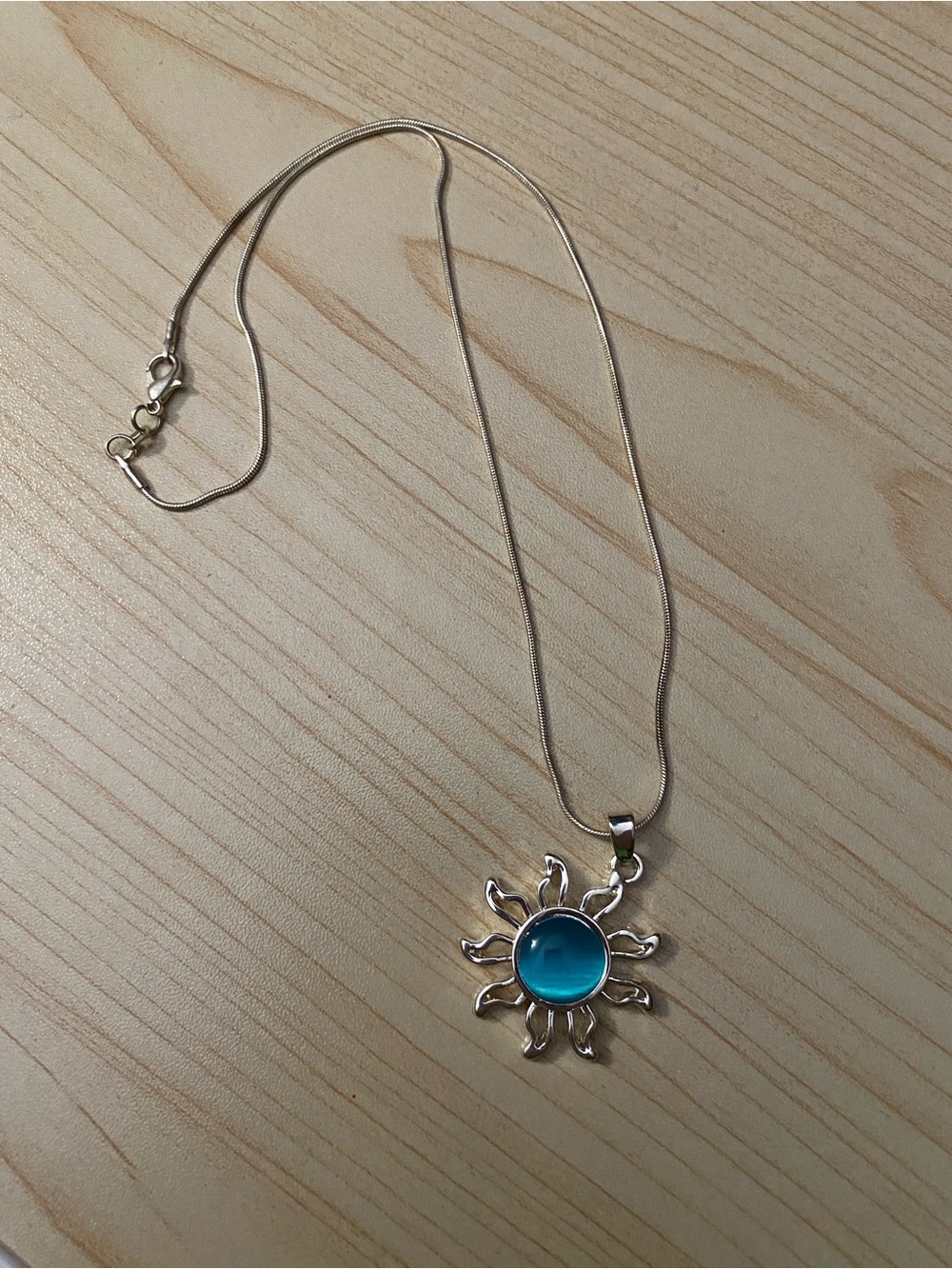 Silver Sunburst Necklace with Blue Cabochon Pendant